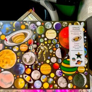 Space themed Solar system puzzle with unique shaped pieces 
1000 pieces